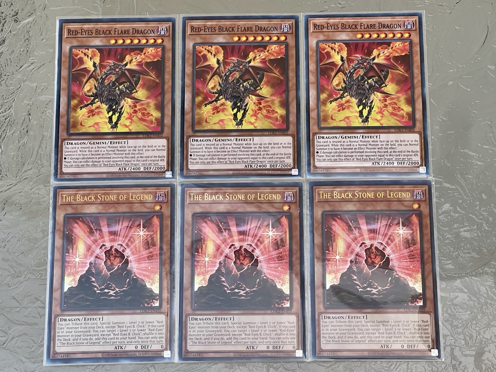 3x The Black Stone Of Legend + 3x Red-Eyes Black Flare Dragon | YuGiOh!