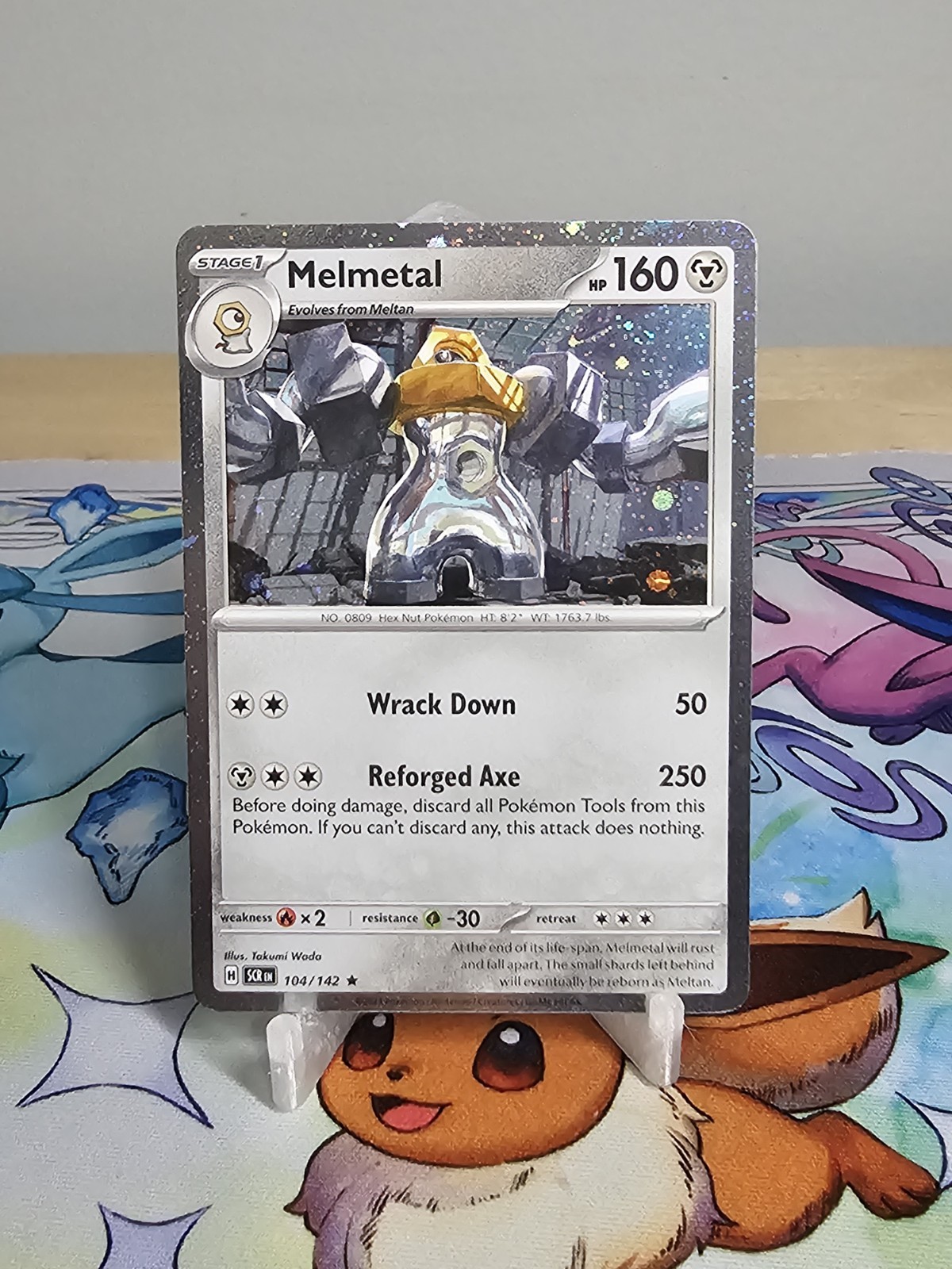 Melmetal – (Cosmos Holo) 104/142 Miscellaneous Cards & Products Holo