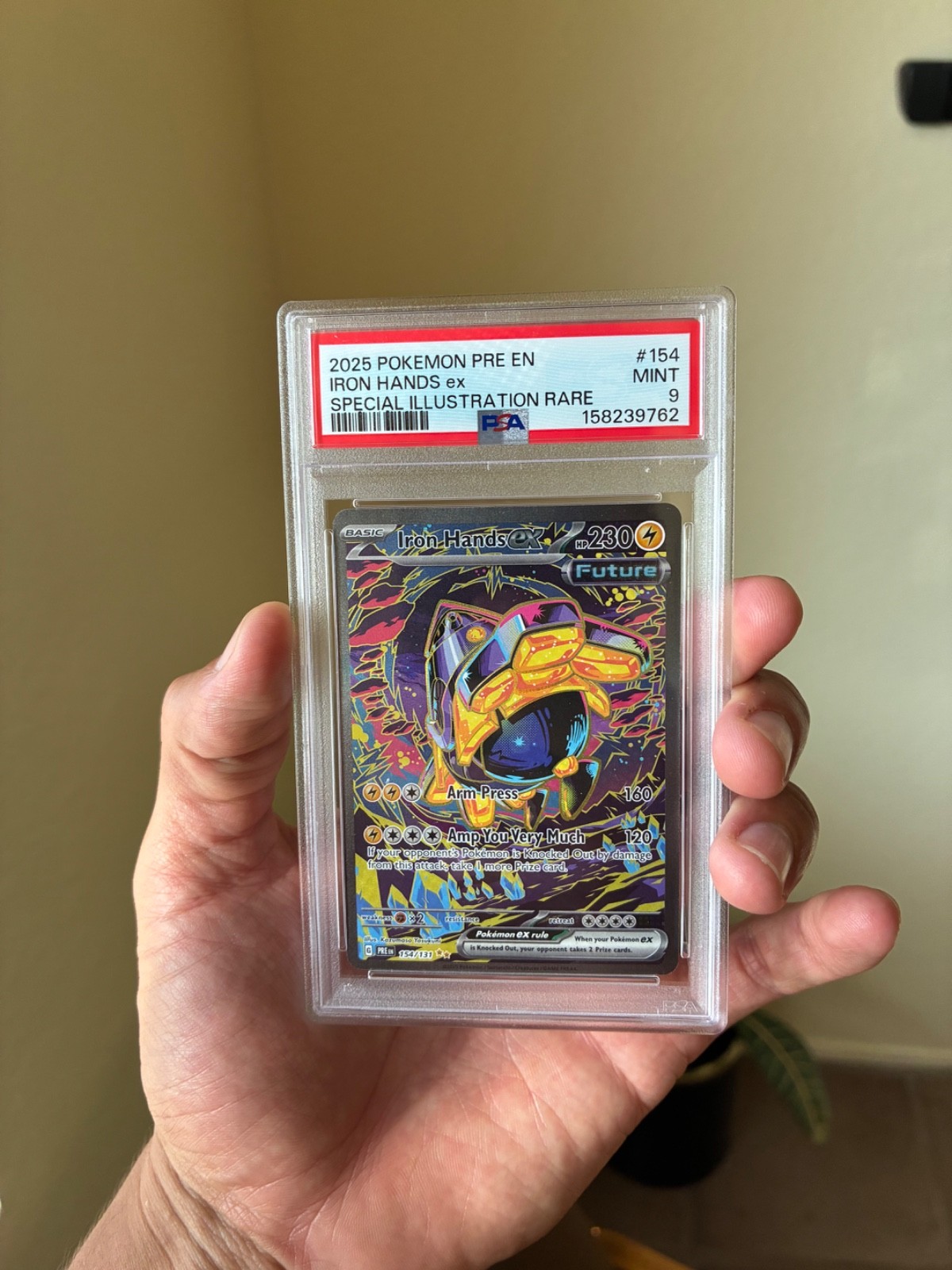 Iron Hands ex 154/131 Sv: Prismatic Evolutions Holo