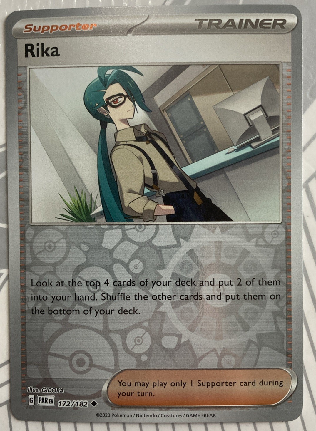 Rika 172/182 Reverse Holo Pokemon Paradox Rift NM