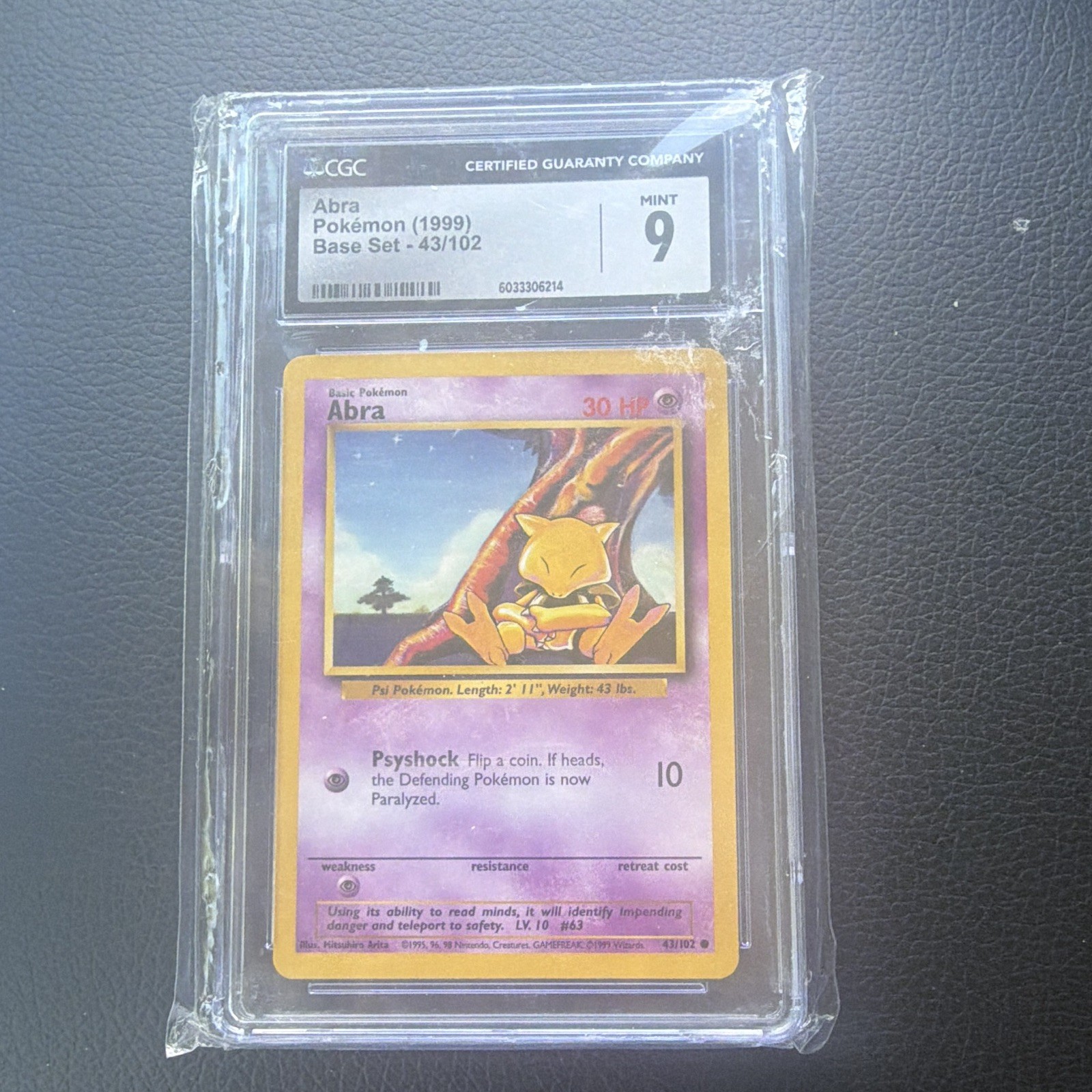 The Pokémon Company Abra 43/102 Base Set Regular English Common CGC 9 1999