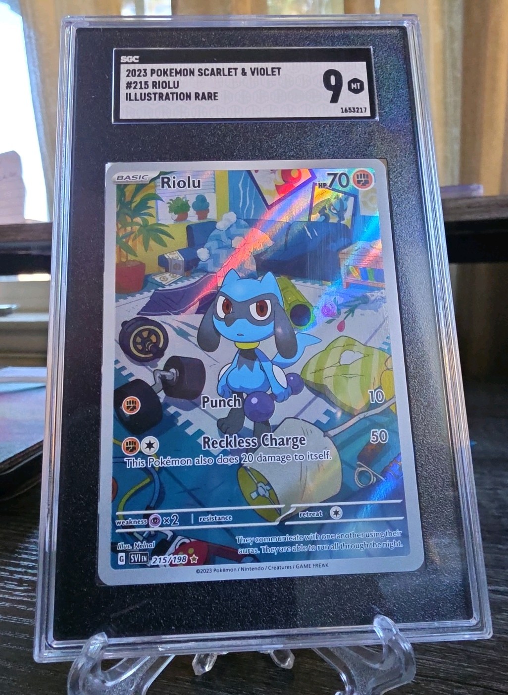 2023 Pokémon Scarlet & Violet 215/198 – RIOLU – Illustration Rare Holo SGC 9 MT