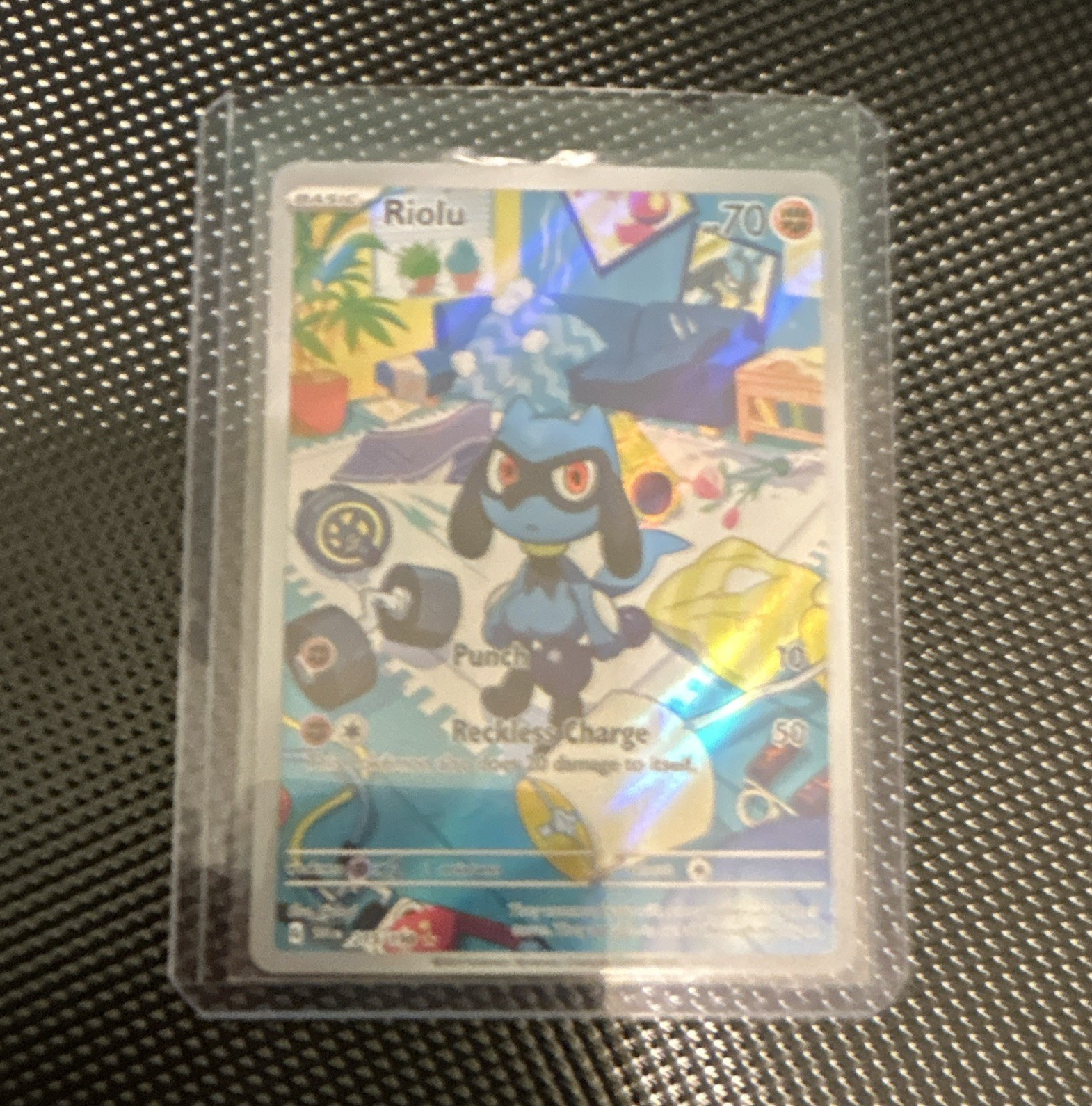 The Pokémon Company Riolu 215/198 Illustration Rare Holo EN Basic 70 HP