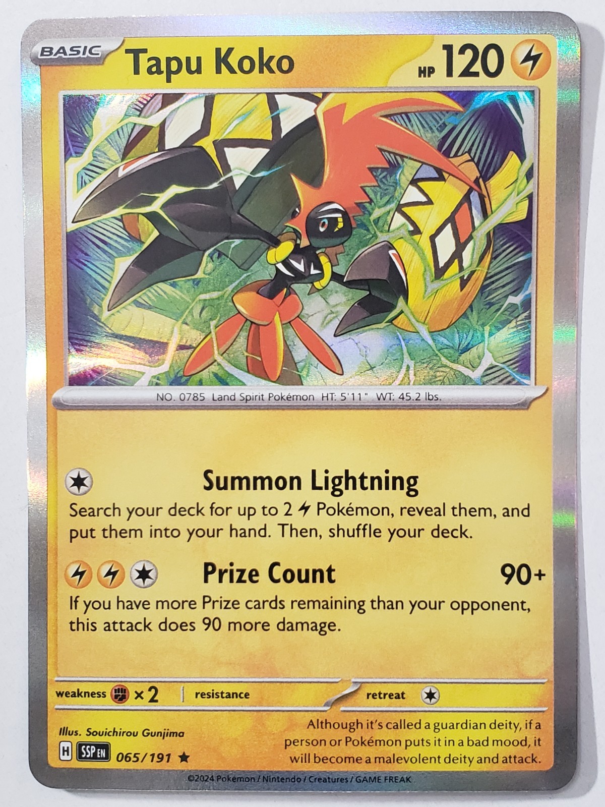 HOLO Tapu Koko 065/191 NM / M Surging Sparks Pokemon Card Souichirou Gunjima Art
